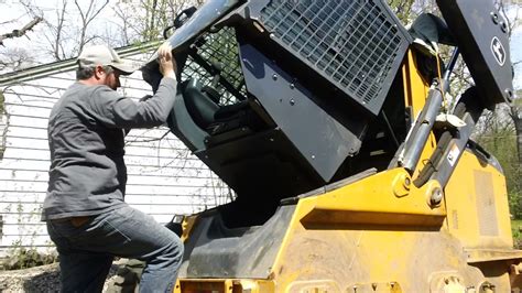 how to raise cab roof on john deere skid steer|skid steer cab lift.